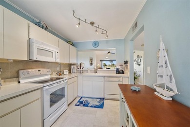 Condo Retreat Near the Gulf -Turnkey & Totally Charming. Ready on Capri Isle Golf Club in Florida - for sale on GolfHomes.com, golf home, golf lot