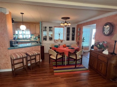 NEW REDUCED PRICE! Delight in the features of Palm Hill Country on Palm Hill Golf Club in Florida - for sale on GolfHomes.com, golf home, golf lot