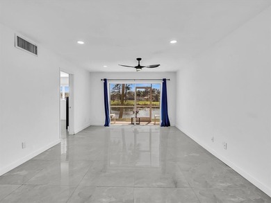 Rarely available 2/2 first-floor unit with stunning water views! on  in Florida - for sale on GolfHomes.com, golf home, golf lot