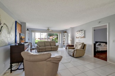 Welcome to this spacious first-floor condo, perfectly situated on Poinciana Golf Club in Florida - for sale on GolfHomes.com, golf home, golf lot