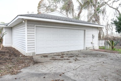 This charming home is nestled on the edge of Ocean Pond on Francis Lake Golf Club in Georgia - for sale on GolfHomes.com, golf home, golf lot