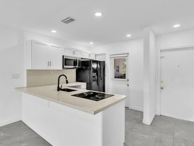 Rarely available 2/2 first-floor unit with stunning water views! on  in Florida - for sale on GolfHomes.com, golf home, golf lot