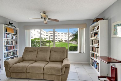 Welcome to this spacious first-floor condo, perfectly situated on Poinciana Golf Club in Florida - for sale on GolfHomes.com, golf home, golf lot