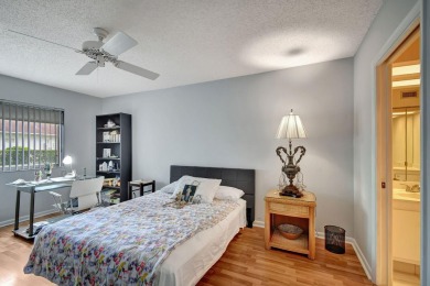 Welcome to this spacious first-floor condo, perfectly situated on Poinciana Golf Club in Florida - for sale on GolfHomes.com, golf home, golf lot