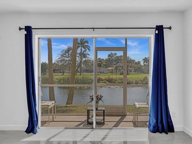 Rarely available 2/2 first-floor unit with stunning water views! on  in Florida - for sale on GolfHomes.com, golf home, golf lot