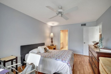 Welcome to this spacious first-floor condo, perfectly situated on Poinciana Golf Club in Florida - for sale on GolfHomes.com, golf home, golf lot