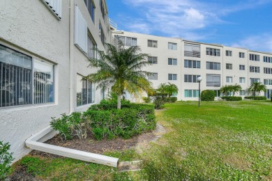 Welcome to this spacious first-floor condo, perfectly situated on Poinciana Golf Club in Florida - for sale on GolfHomes.com, golf home, golf lot