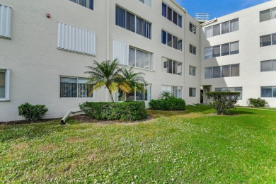Welcome to this spacious first-floor condo, perfectly situated on Poinciana Golf Club in Florida - for sale on GolfHomes.com, golf home, golf lot