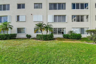 Welcome to this spacious first-floor condo, perfectly situated on Poinciana Golf Club in Florida - for sale on GolfHomes.com, golf home, golf lot