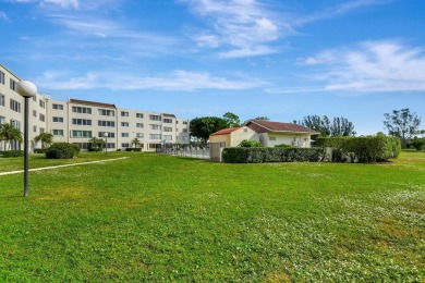 Welcome to this spacious first-floor condo, perfectly situated on Poinciana Golf Club in Florida - for sale on GolfHomes.com, golf home, golf lot