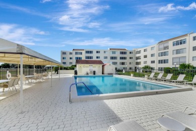 Welcome to this spacious first-floor condo, perfectly situated on Poinciana Golf Club in Florida - for sale on GolfHomes.com, golf home, golf lot