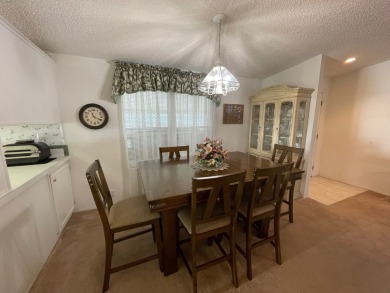 Listed by the Official Sales Team of Cypress Lakes Village on Big Cypress Golf and Country Club in Florida - for sale on GolfHomes.com, golf home, golf lot