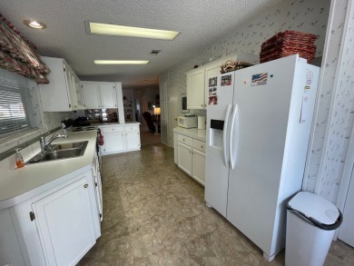 Listed by the Official Sales Team of Cypress Lakes Village on Big Cypress Golf and Country Club in Florida - for sale on GolfHomes.com, golf home, golf lot