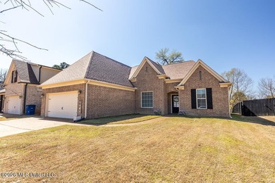 Welcome to this beautifully crafted 4-bedroom, 2-bath home built on Wedgewood Golfers Club in Mississippi - for sale on GolfHomes.com, golf home, golf lot