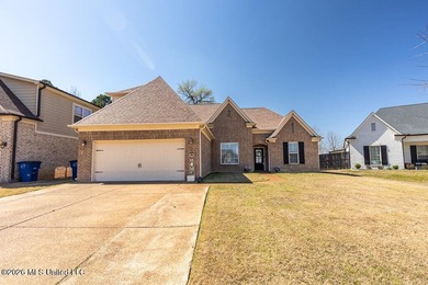 Welcome to this beautifully crafted 4-bedroom, 2-bath home built on Wedgewood Golfers Club in Mississippi - for sale on GolfHomes.com, golf home, golf lot