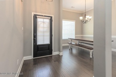 Welcome to this beautifully crafted 4-bedroom, 2-bath home built on Wedgewood Golfers Club in Mississippi - for sale on GolfHomes.com, golf home, golf lot