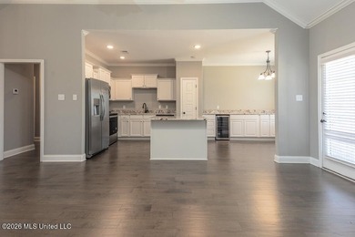 Welcome to this beautifully crafted 4-bedroom, 2-bath home built on Wedgewood Golfers Club in Mississippi - for sale on GolfHomes.com, golf home, golf lot