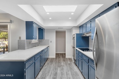 Beautifully updated and truly move-in ready, this Sun City home on Sun City Lakes West and East in Arizona - for sale on GolfHomes.com, golf home, golf lot