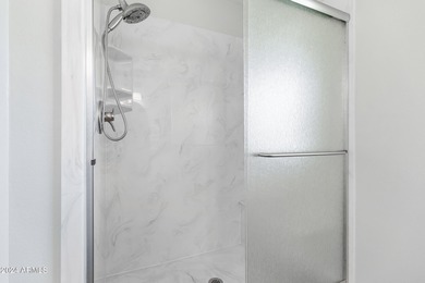 Beautifully updated and truly move-in ready, this Sun City home on Sun City Lakes West and East in Arizona - for sale on GolfHomes.com, golf home, golf lot