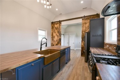 This charming countryside gem is nestled across from Colin Creek on Lake Louise Golf Club in North Carolina - for sale on GolfHomes.com, golf home, golf lot
