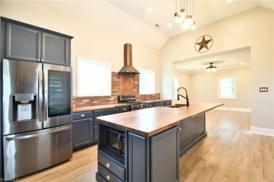 This charming countryside gem is nestled across from Colin Creek on Lake Louise Golf Club in North Carolina - for sale on GolfHomes.com, golf home, golf lot