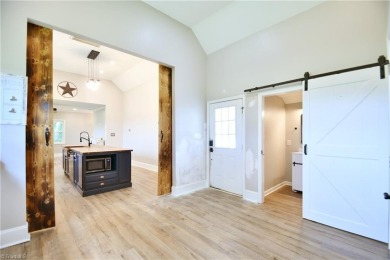 This charming countryside gem is nestled across from Colin Creek on Lake Louise Golf Club in North Carolina - for sale on GolfHomes.com, golf home, golf lot