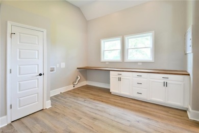 This charming countryside gem is nestled across from Colin Creek on Lake Louise Golf Club in North Carolina - for sale on GolfHomes.com, golf home, golf lot