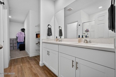 A total showstopper designed for the ultimate Florida lifestyle on LPGA International Golf Course in Florida - for sale on GolfHomes.com, golf home, golf lot