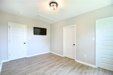 This charming countryside gem is nestled across from Colin Creek on Lake Louise Golf Club in North Carolina - for sale on GolfHomes.com, golf home, golf lot