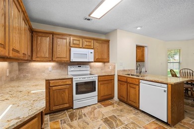 Don't miss this meticulously maintained, two-owner home in the on Pecan Plantation Country Club in Texas - for sale on GolfHomes.com, golf home, golf lot