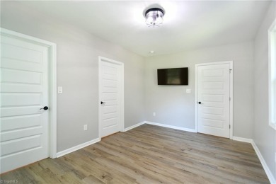 This charming countryside gem is nestled across from Colin Creek on Lake Louise Golf Club in North Carolina - for sale on GolfHomes.com, golf home, golf lot