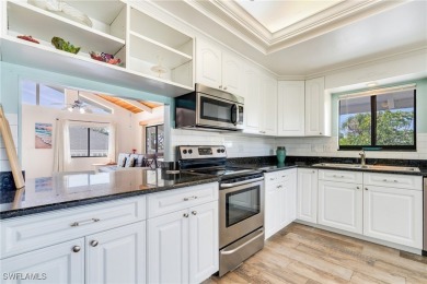 This classic Florida island home is located within the Alden on Alden Pines Golf Club in Florida - for sale on GolfHomes.com, golf home, golf lot