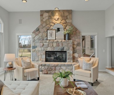 Nestled at the end of a private cul-de-sac, this stunning 4,017 on Stonebridge Golf Club in Michigan - for sale on GolfHomes.com, golf home, golf lot