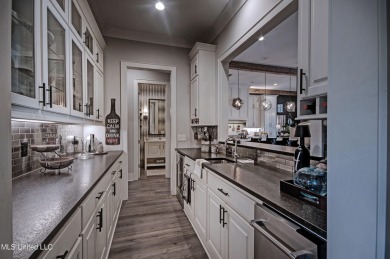 The one you've been waiting for! This stunning home offers the on Lake Caroline Golf Club in Mississippi - for sale on GolfHomes.com, golf home, golf lot