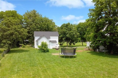 This charming countryside gem is nestled across from Colin Creek on Lake Louise Golf Club in North Carolina - for sale on GolfHomes.com, golf home, golf lot