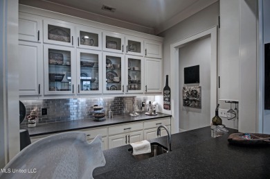 The one you've been waiting for! This stunning home offers the on Lake Caroline Golf Club in Mississippi - for sale on GolfHomes.com, golf home, golf lot