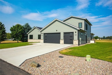 Welcome to this stunning three-bedroom + office home in Ronan on Mission Mountain Country Club in Montana - for sale on GolfHomes.com, golf home, golf lot