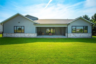 Welcome to this stunning three-bedroom + office home in Ronan on Mission Mountain Country Club in Montana - for sale on GolfHomes.com, golf home, golf lot