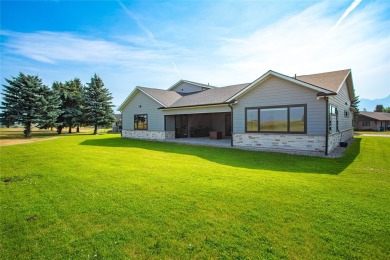 Welcome to this stunning three-bedroom + office home in Ronan on Mission Mountain Country Club in Montana - for sale on GolfHomes.com, golf home, golf lot