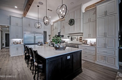 The one you've been waiting for! This stunning home offers the on Lake Caroline Golf Club in Mississippi - for sale on GolfHomes.com, golf home, golf lot