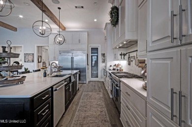 The one you've been waiting for! This stunning home offers the on Lake Caroline Golf Club in Mississippi - for sale on GolfHomes.com, golf home, golf lot