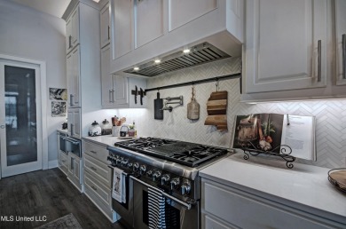 The one you've been waiting for! This stunning home offers the on Lake Caroline Golf Club in Mississippi - for sale on GolfHomes.com, golf home, golf lot