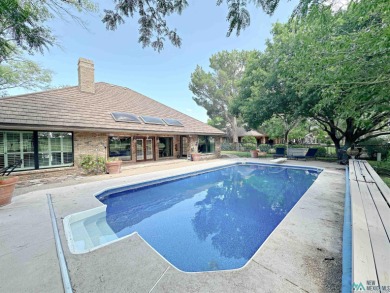 Nestled in a desirable NW location on a cul-de-sac, this on New Mexico Military Institute Golf Course in New Mexico - for sale on GolfHomes.com, golf home, golf lot