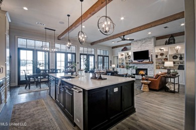 The one you've been waiting for! This stunning home offers the on Lake Caroline Golf Club in Mississippi - for sale on GolfHomes.com, golf home, golf lot