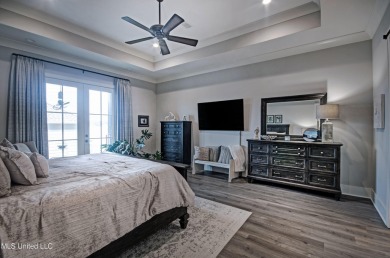 The one you've been waiting for! This stunning home offers the on Lake Caroline Golf Club in Mississippi - for sale on GolfHomes.com, golf home, golf lot