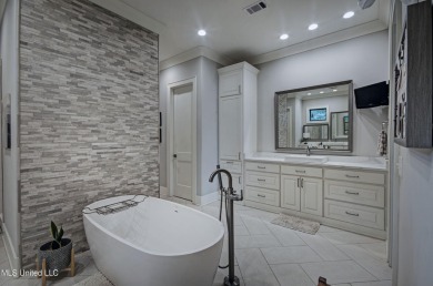 The one you've been waiting for! This stunning home offers the on Lake Caroline Golf Club in Mississippi - for sale on GolfHomes.com, golf home, golf lot