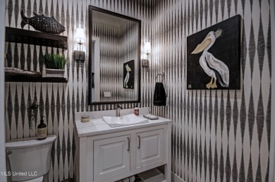 The one you've been waiting for! This stunning home offers the on Lake Caroline Golf Club in Mississippi - for sale on GolfHomes.com, golf home, golf lot