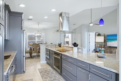 Experience the best of lakefront living within the Plantation on Plantation Golf and Country Club in Florida - for sale on GolfHomes.com, golf home, golf lot