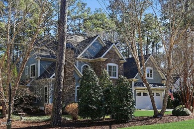 Situated on a beautifully landscaped corner lot in the on Governors Club in North Carolina - for sale on GolfHomes.com, golf home, golf lot