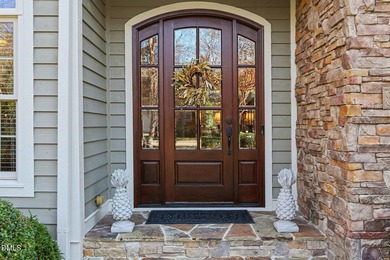 Situated on a beautifully landscaped corner lot in the on Governors Club in North Carolina - for sale on GolfHomes.com, golf home, golf lot